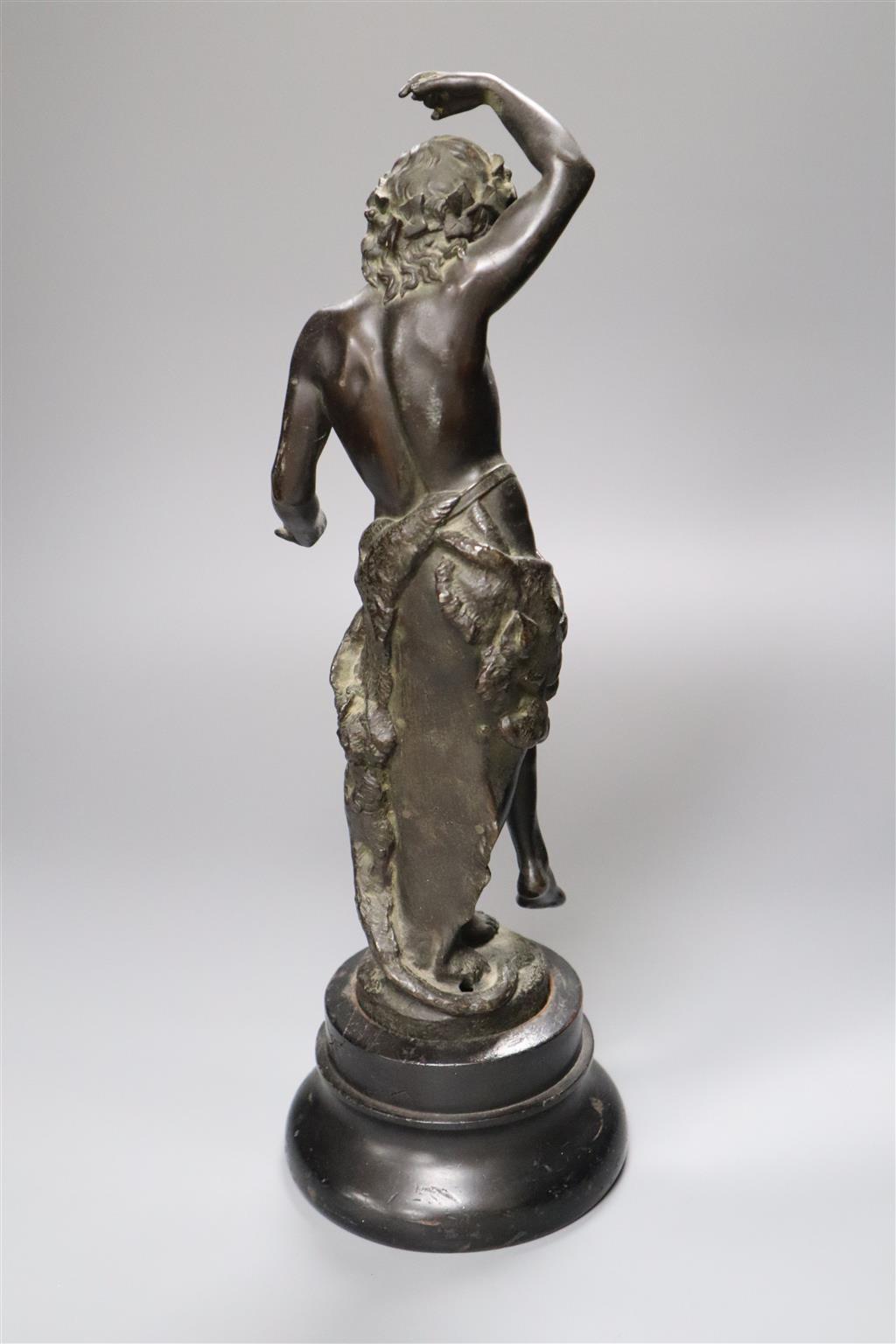 A 19th century bronze figure of a dancing bacchanal, indistinctly signed, 42cm high overall